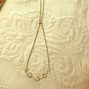 Kendra Scott necklace with iridescent stones